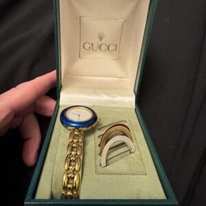 Gucci Gold Watch with Blue Bezel and Extra Bezels